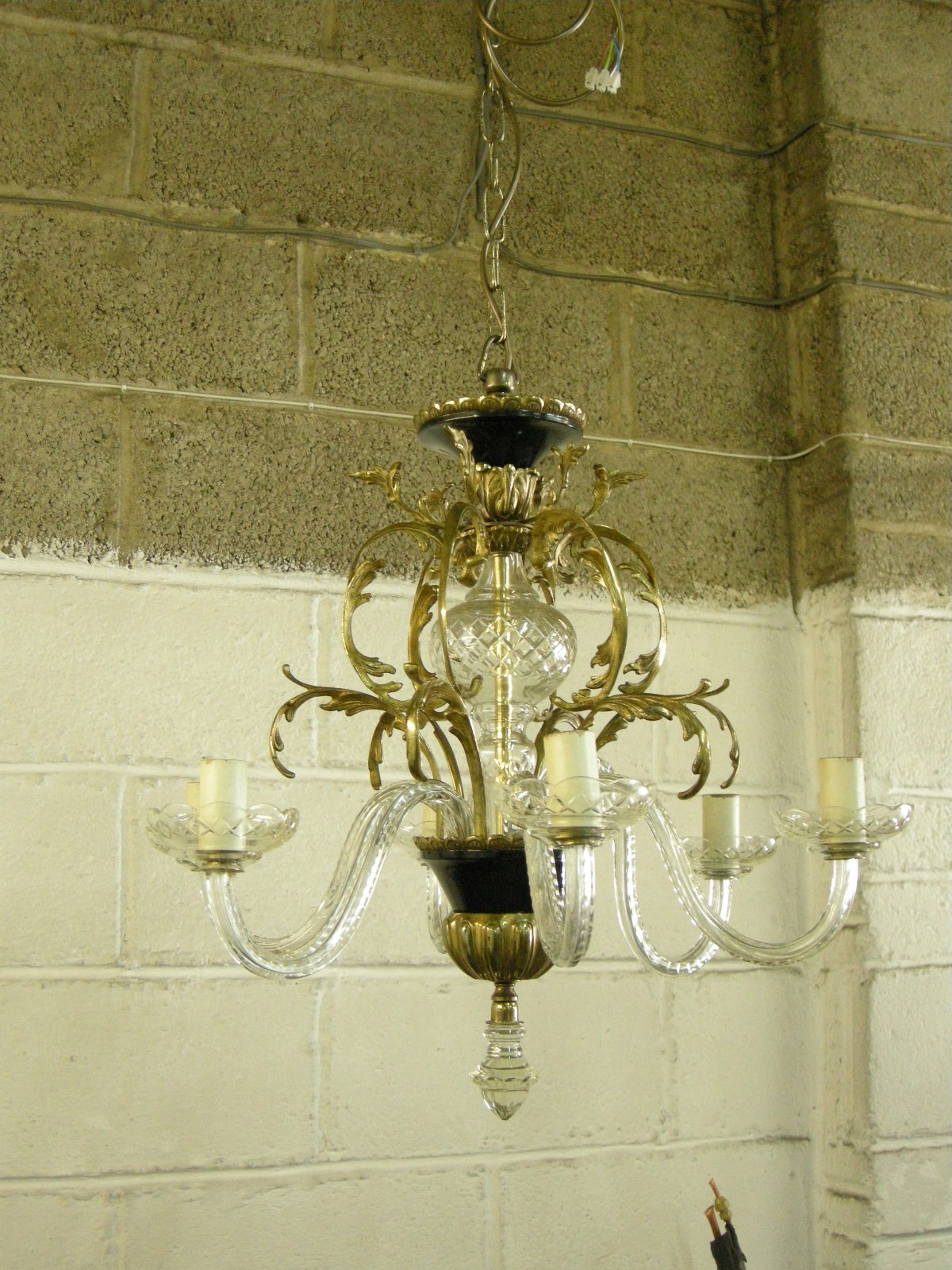 glass and brass chandelier after restoration